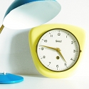Ancienne horloge "Garant" cramique jaune.
